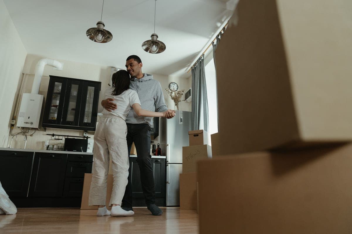 Moving boxes stacked in an empty rental apartment